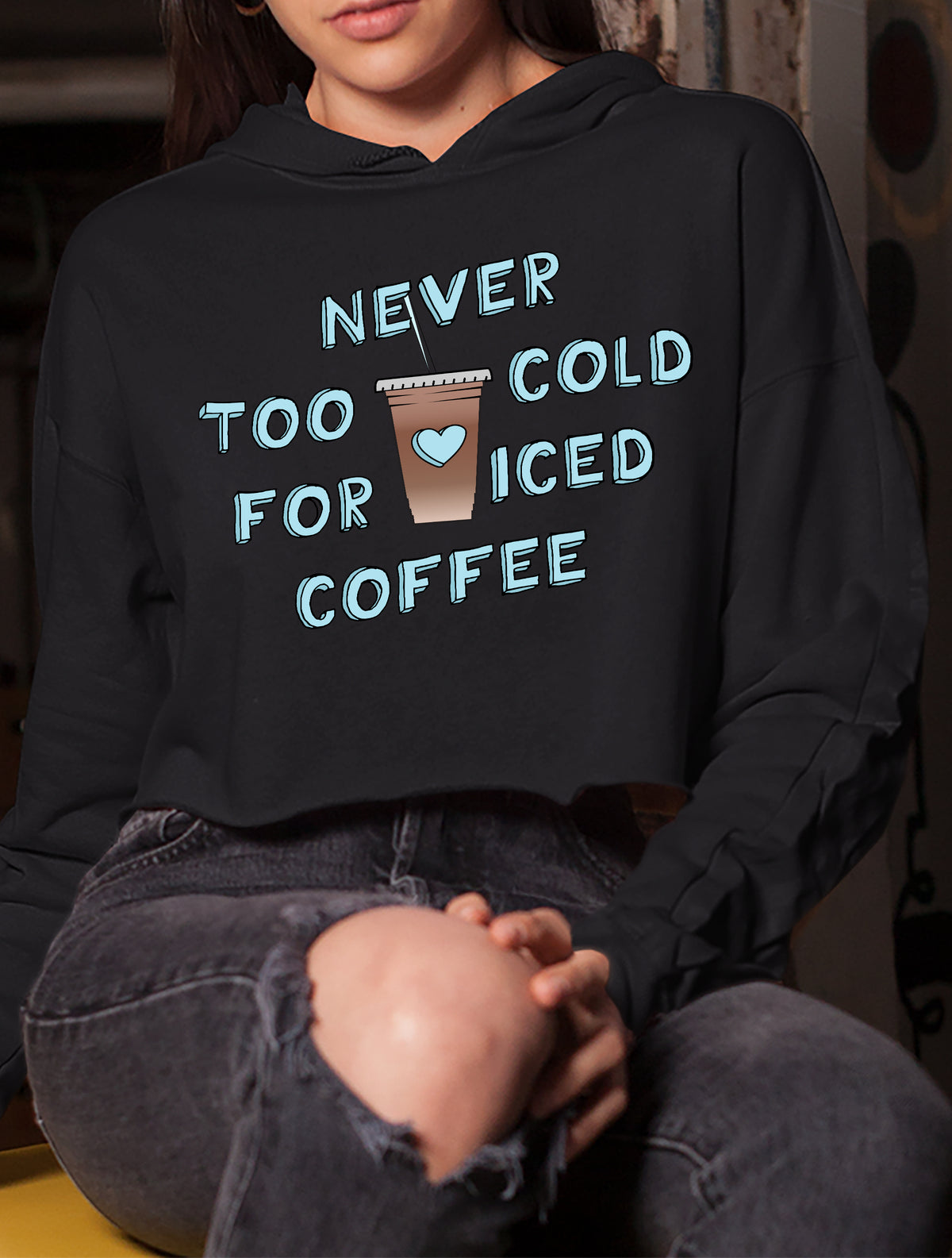 Black crop hoodie with a iced coffee that says never too cold for iced coffee - HighCiti