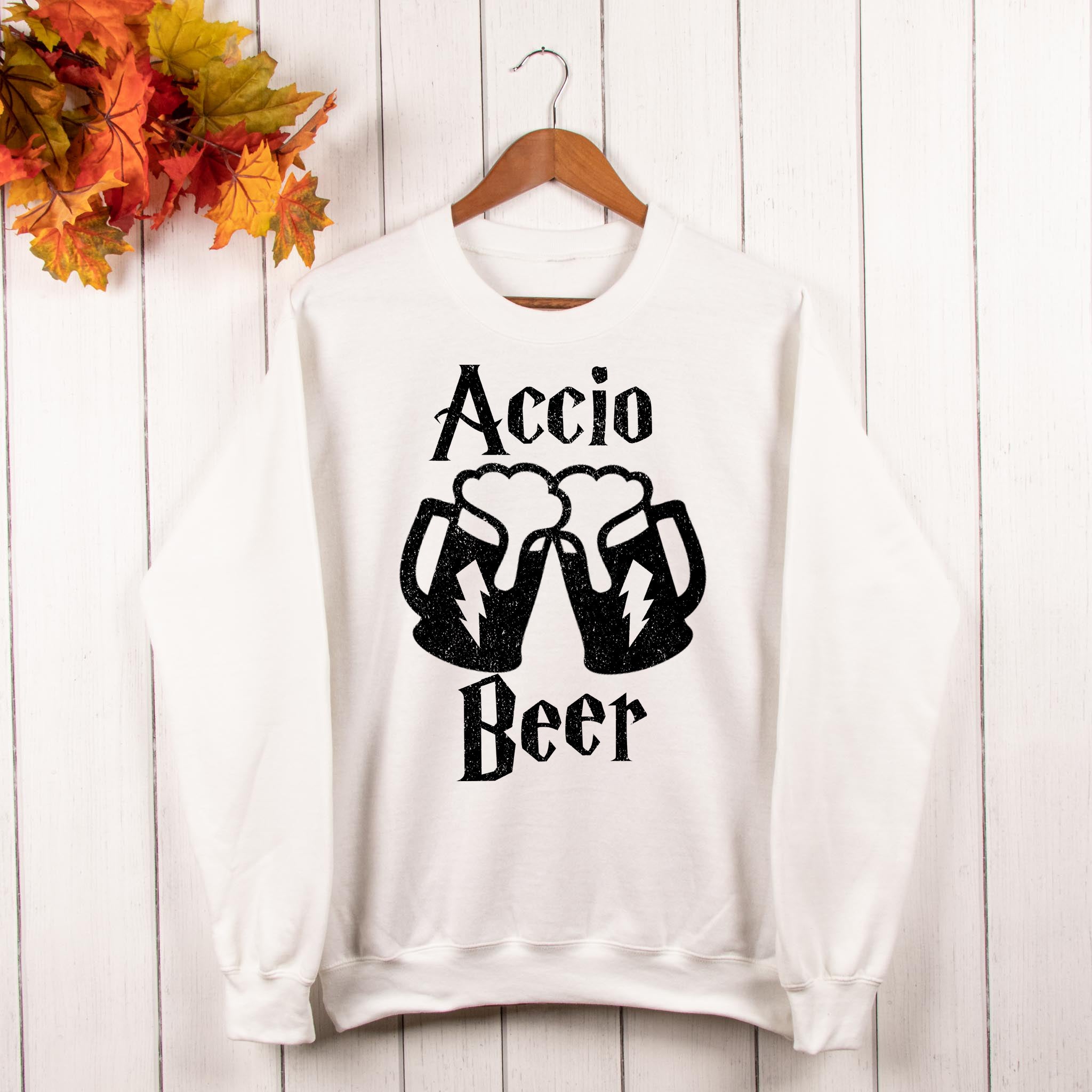white sweater that says accio beer - HighCiti