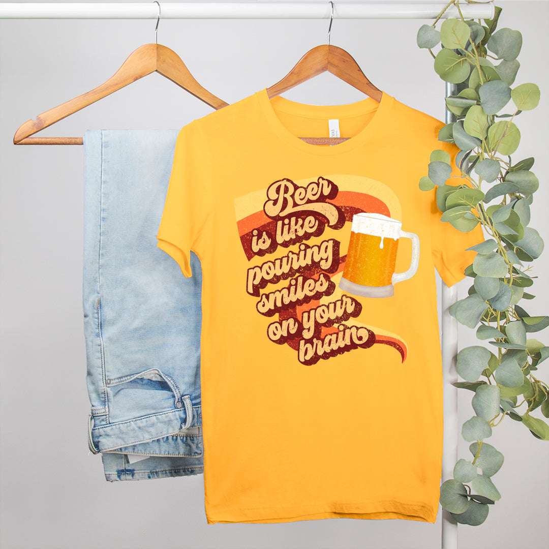 gold shirt that says beer is like pouring smiles on your brain - HighCiti