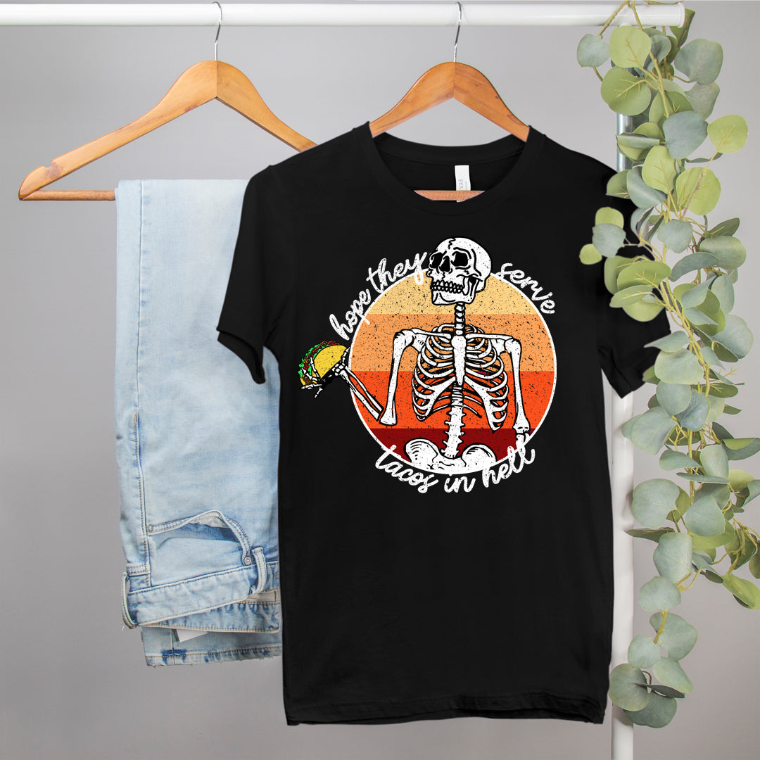 funny taco shirt with a skeleton that says hope they serve tacos in hell - HighCiti