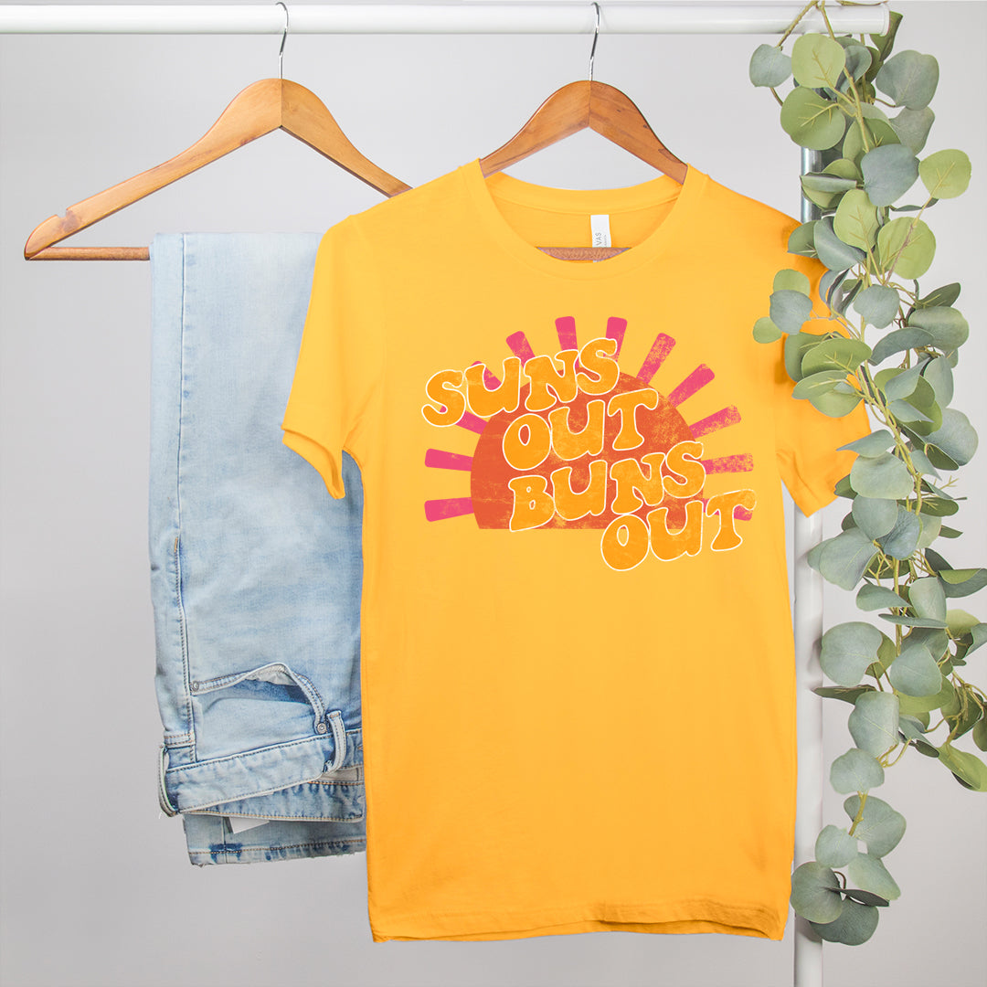 gold shirt with a sunshine that says suns out buns out - HighCiti