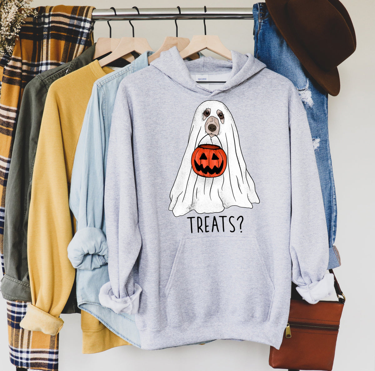 black hoodie with a dog as a ghost holding a pumpkin jar that says treats? - HighCiti