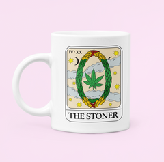 White mug with a tarot card and a cannabis leaf saying the stoner - HighCiti