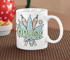 White mug with blunts and weed leaf saying drugs - HighCiti