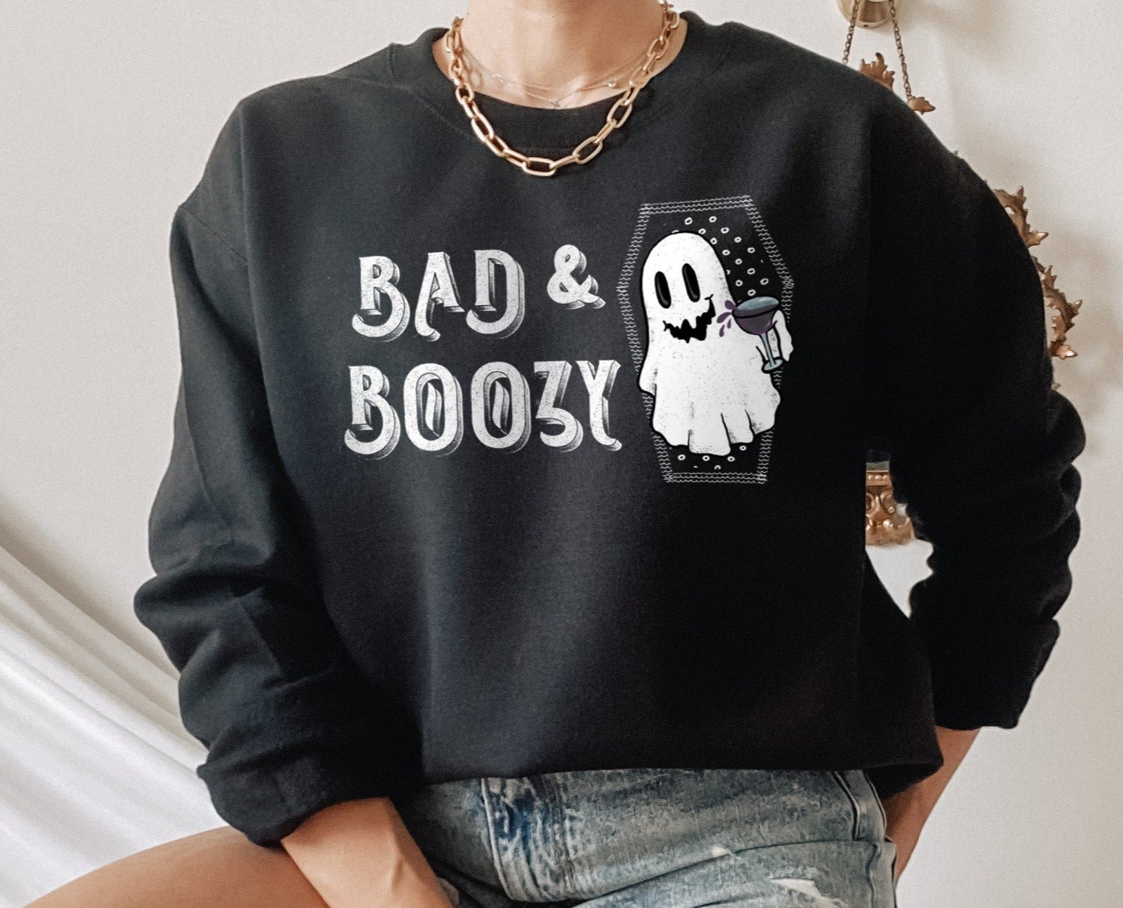 black sweater with a ghost drinking that says bad and boozy - HighCiti