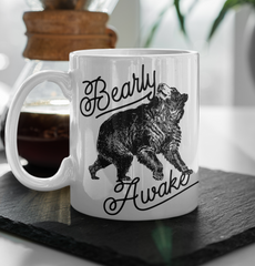 White coffee mug with a bear that says bearly awake - HighCiti