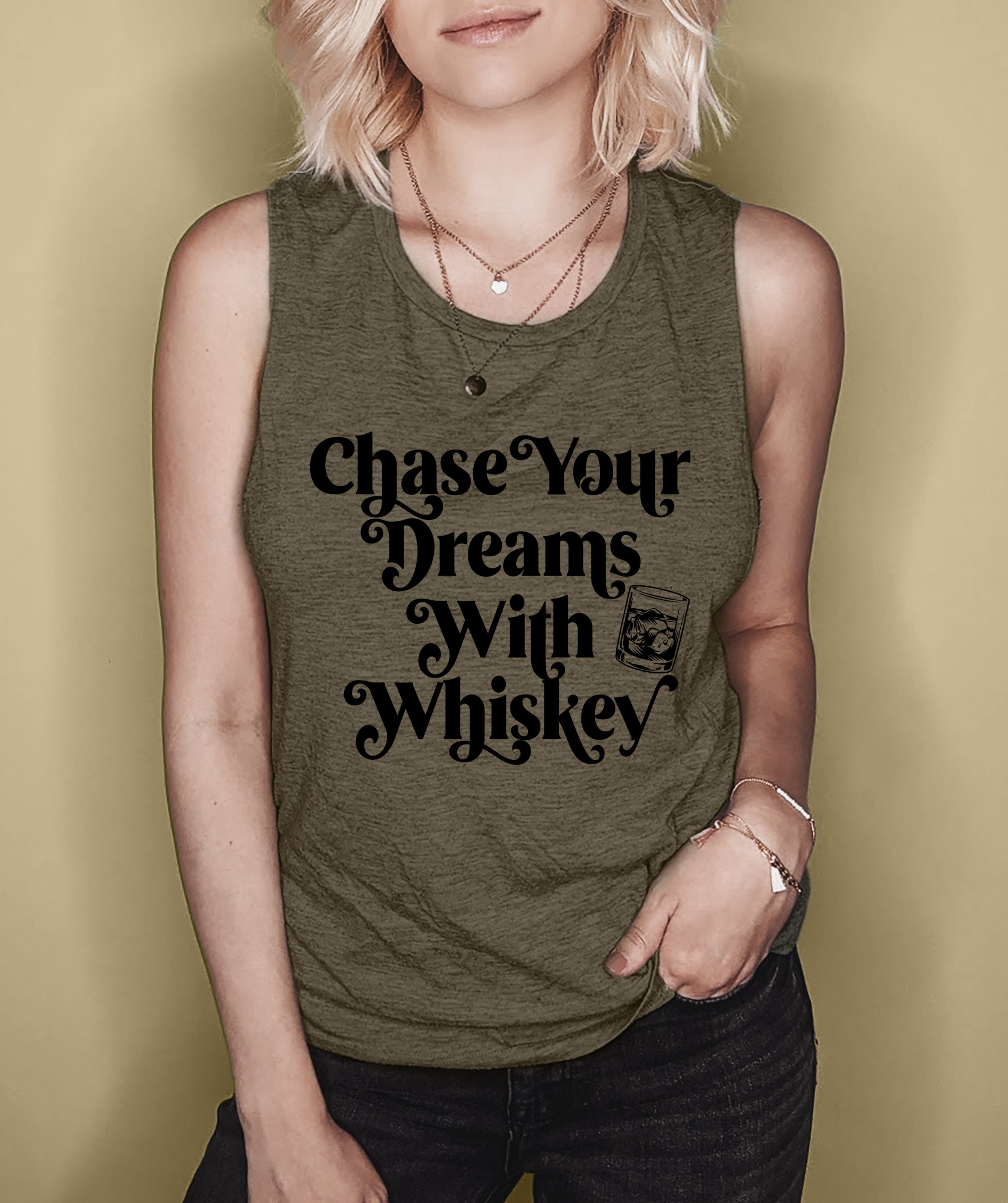 Heather olive muscle tank with a glass of whiskey that says chase your dreams with whiskey - HighCiti