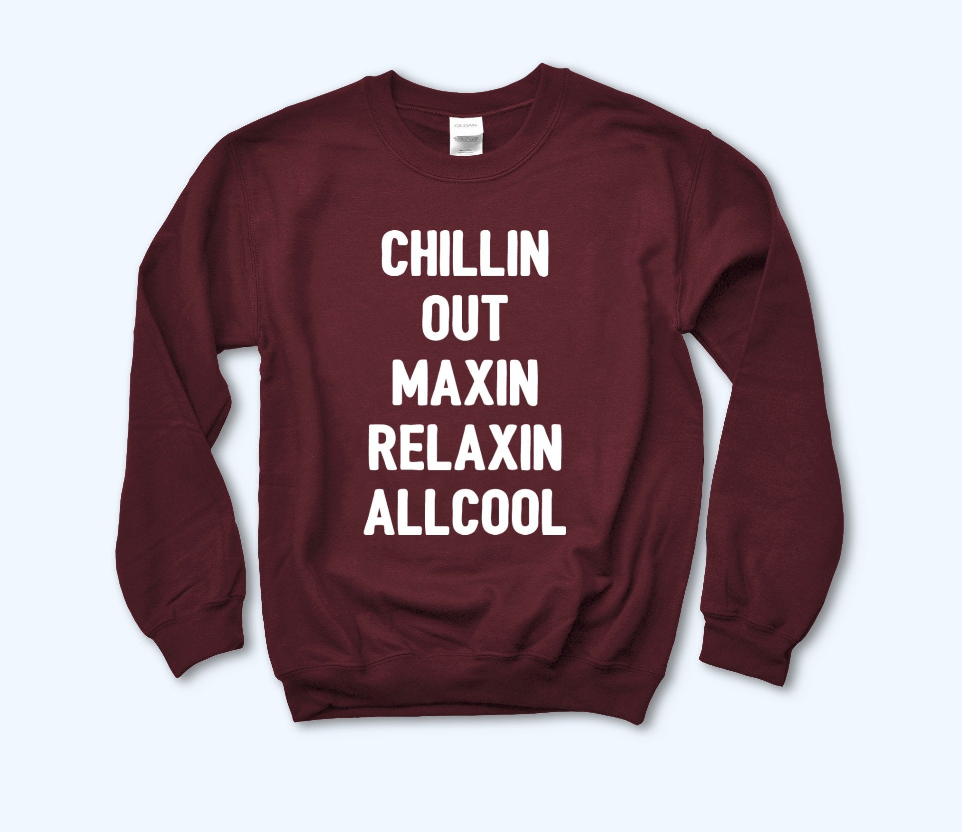 Maroon sweatshirt that says chillin out maxin relaxin all cool - HighCiti