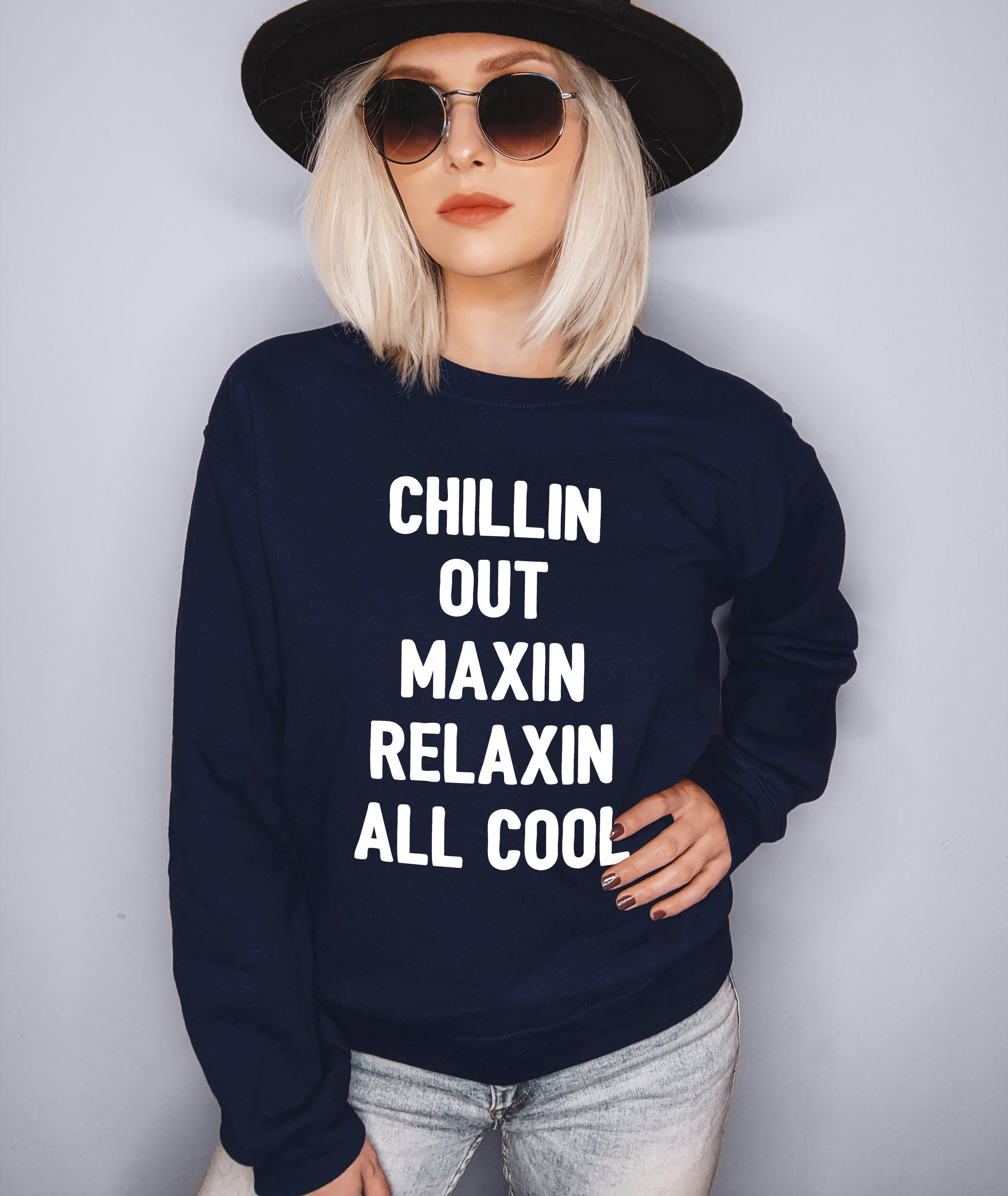 Navy sweatshirt that says chillin out maxin relaxin all cool - HighCiti