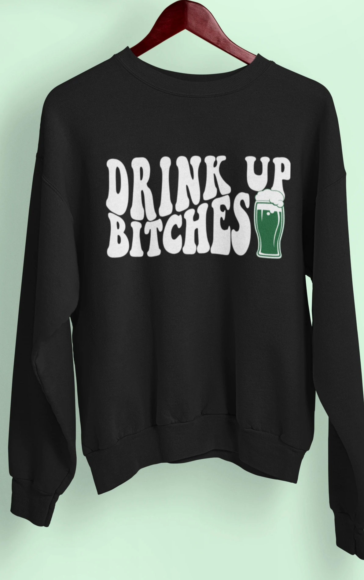 Black sweatshirt with a green beer that says drink up bitches - HighCiti
