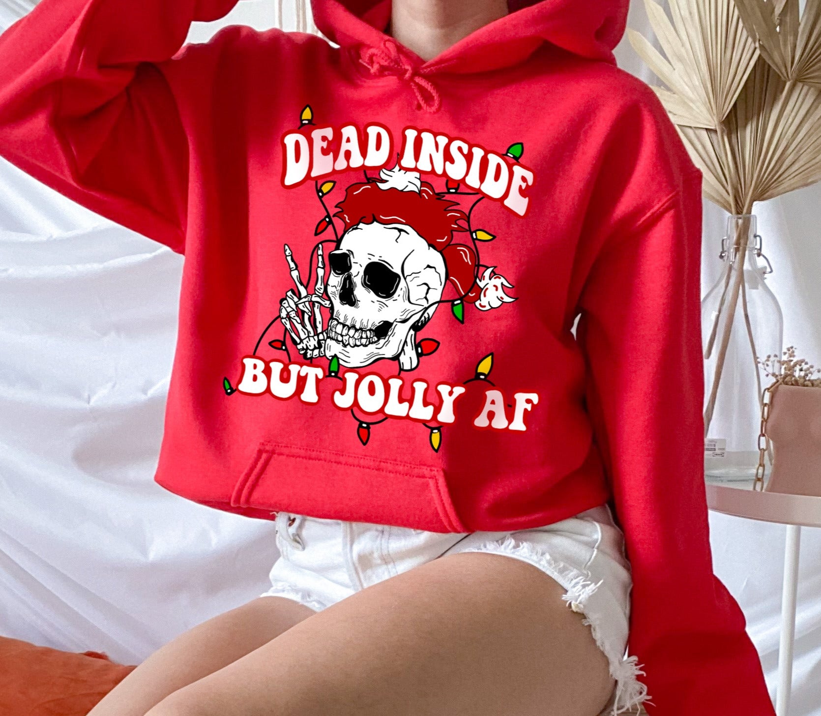 red hoodie with a skull that says dead inside but jolly af - HighCiti