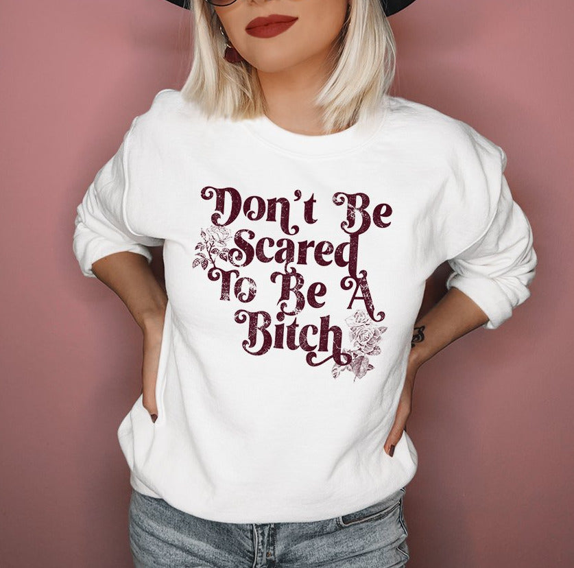 White sweatshirt with retro flowers and text that says don't be scared to be a bitch - HighCiti