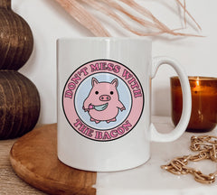 white mug with a pig saying don't mess with the bacon - HighCiti