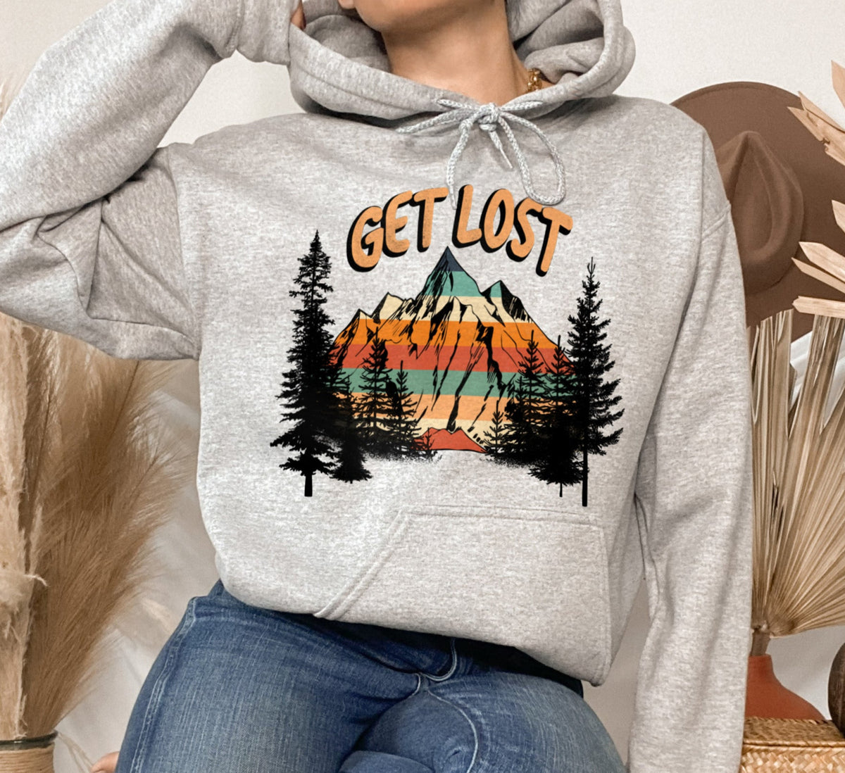grey hoodie with a mountain and a forest that says get lost - HighCiti