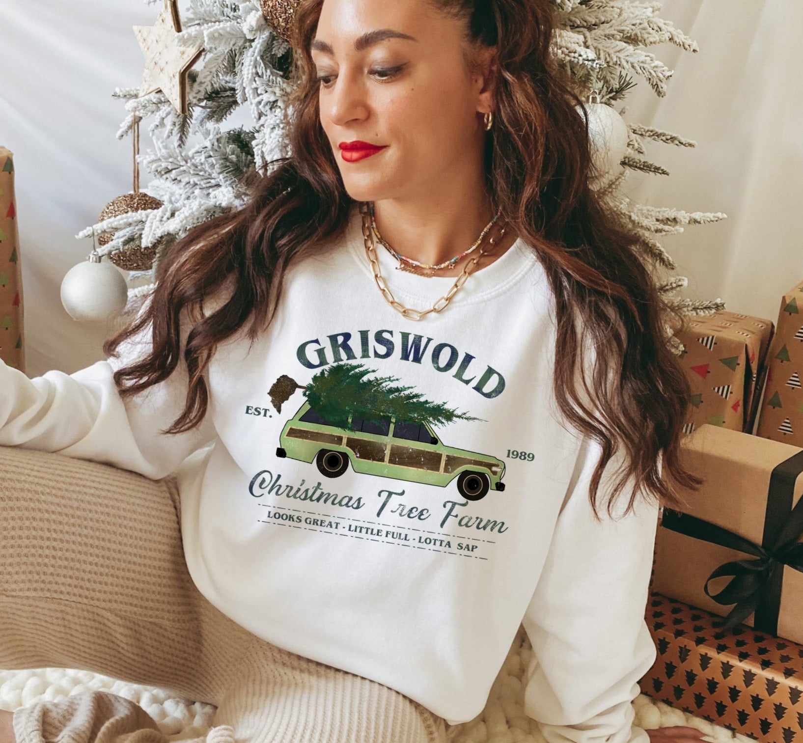 White sweater that says griswold christmas tree farm - HighCiti