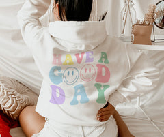 white hoodie that says have a good day - HighCiti