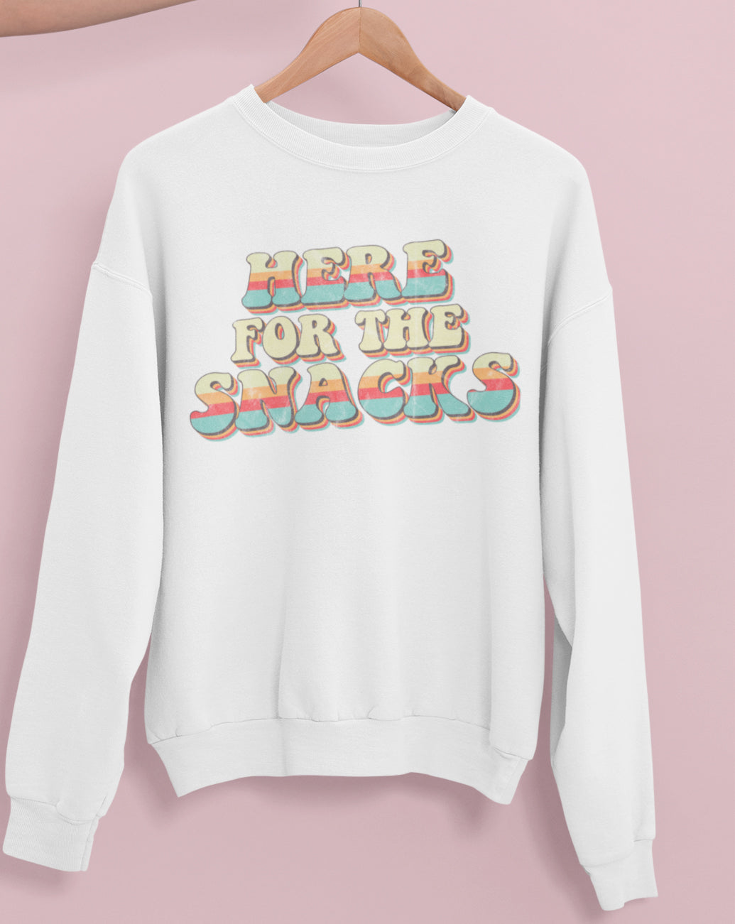 White sweatshirt with colorful retro graphic that says here for the snacks - HighCiti