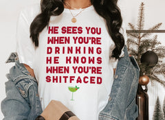 white shirt with a drink that says he sees you when you're drinking he knows when you're shitfaced - HighCiti