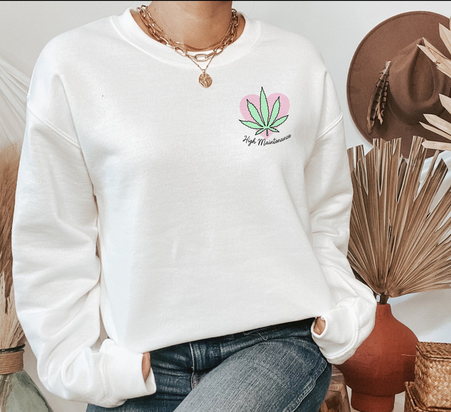 White sweatshirt with a cannabis heart that says high maintenance - HighCiti