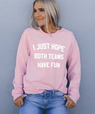 Pink sweatshirt that says I just hope both teams have fun - HighCiti