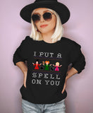 Black sweatshirt with witches from hocus pocus saying I put a spell on you - HighCiti