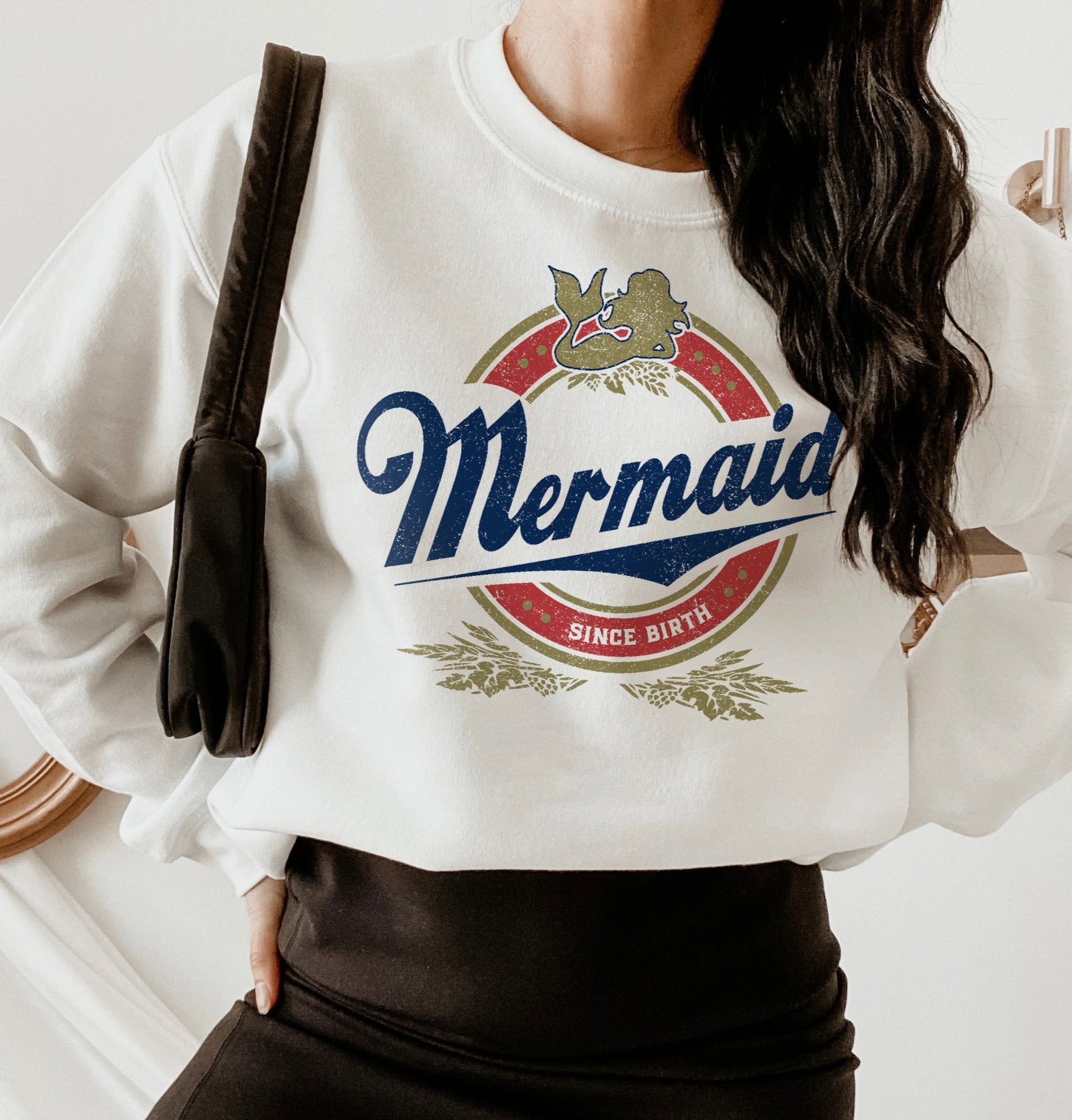 White sweatshirt with a mermaid that says mermaid since birth - HighCiti