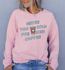 Light pink sweatshirt with a iced coffee that says never too cold for iced coffee - HighCiti