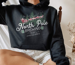 black hoodie that says north pole brewing - HighCiti