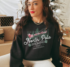 black sweater that says north pole brewing - HighCiti