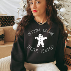 black sweater with a gingerbread that says official cookie taste tester - HighCiti