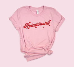 Pink shirt with red hearts saying relationshit - HighCiti