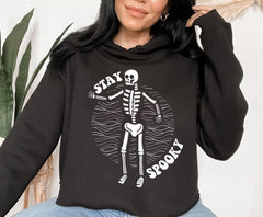 black crop hoodie with a skeleton that says stay spooky - HighCiti