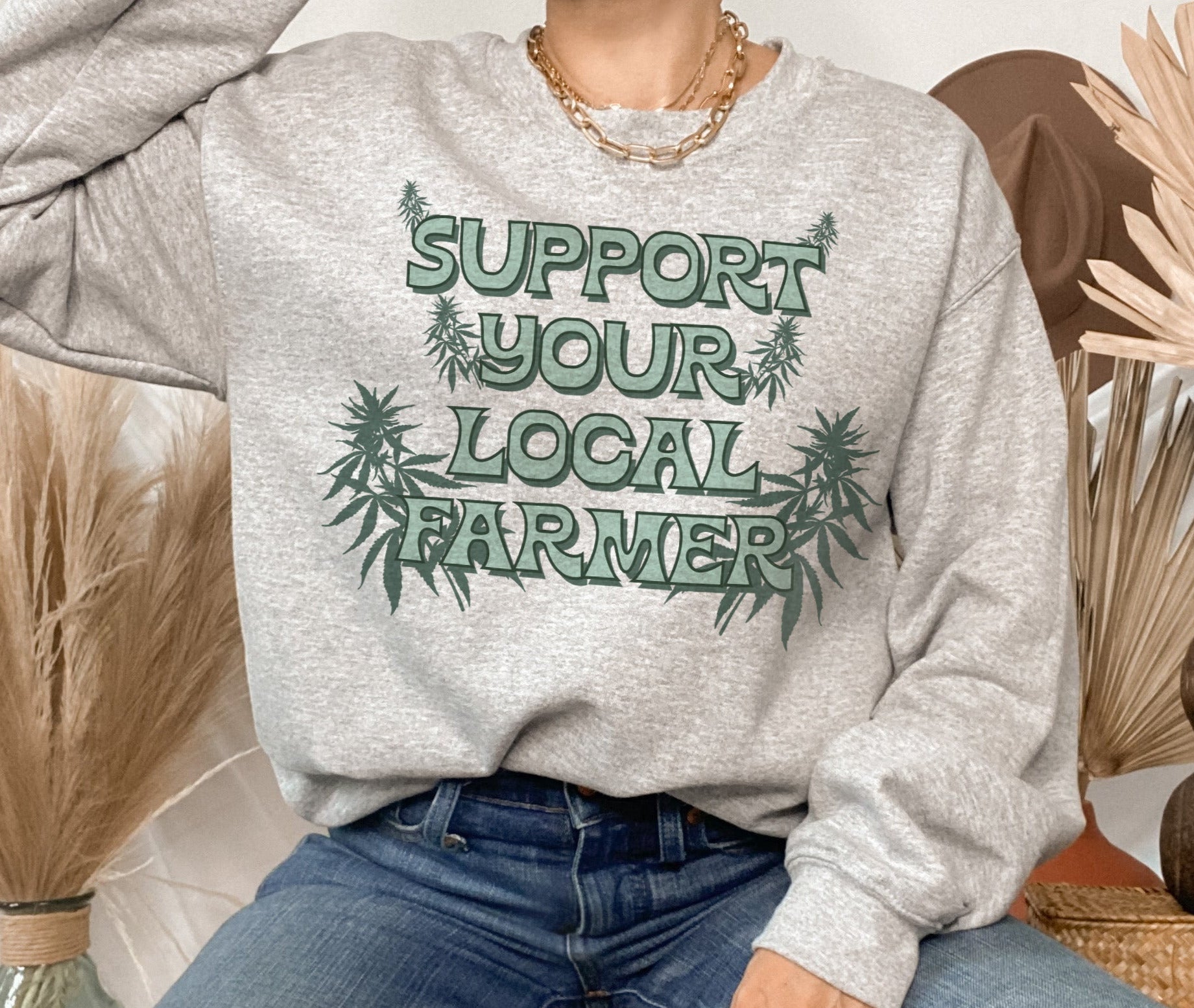 grey sweater with a cannabis plant saying support your local farmer - HighCiti