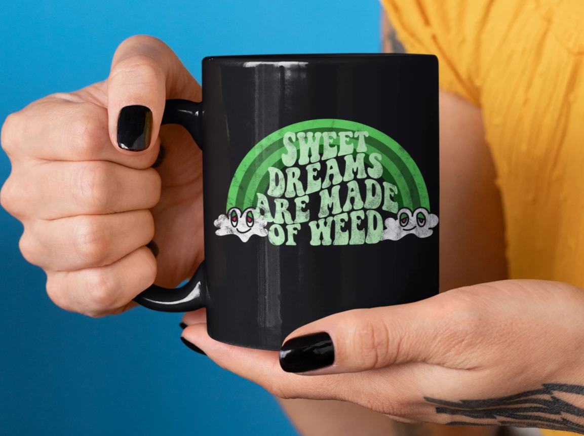 Black mug with a green rainbow that says sweet dreams are made of weed - HighCiti