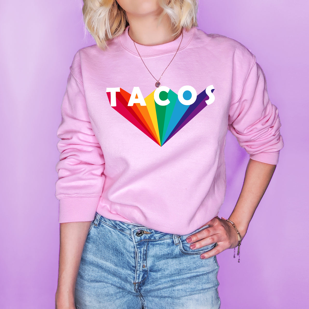 Pink sweatshirt that says tacos in the retro font - HighCiti