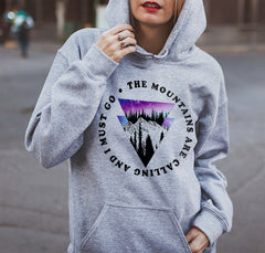 Grey hoodie with tattoo style trees and mountains that says the mountains are calling and I must go - HighCiti