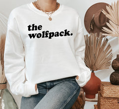 white sweater that says the wolf pack - HighCiti