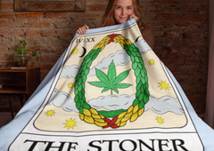 Light blue blanket with a tarot card and a cannabis leaf saying the stoner - HighCiti