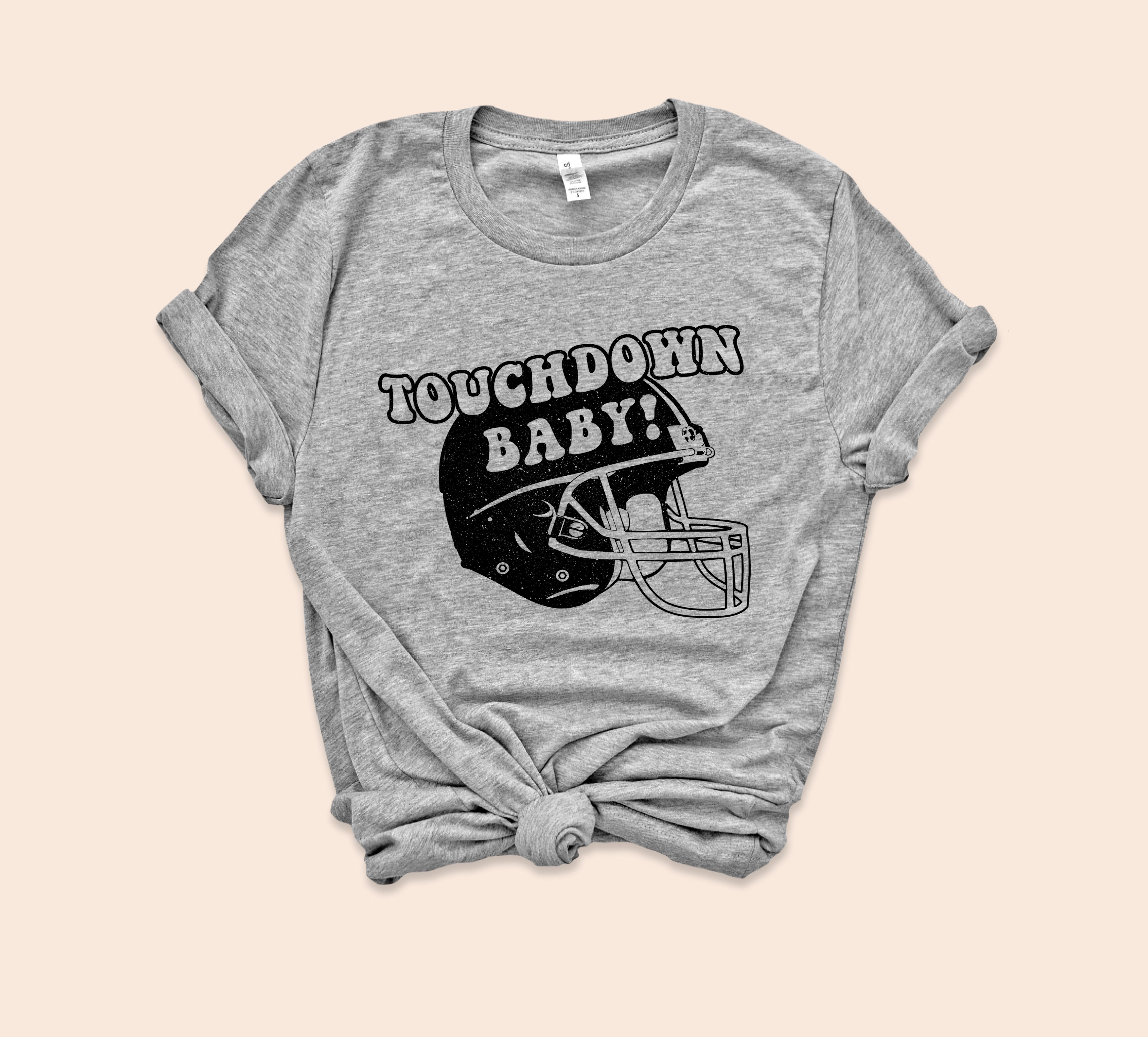 Heather grey shirt with football helmet that says touchdown baby - HighCiti