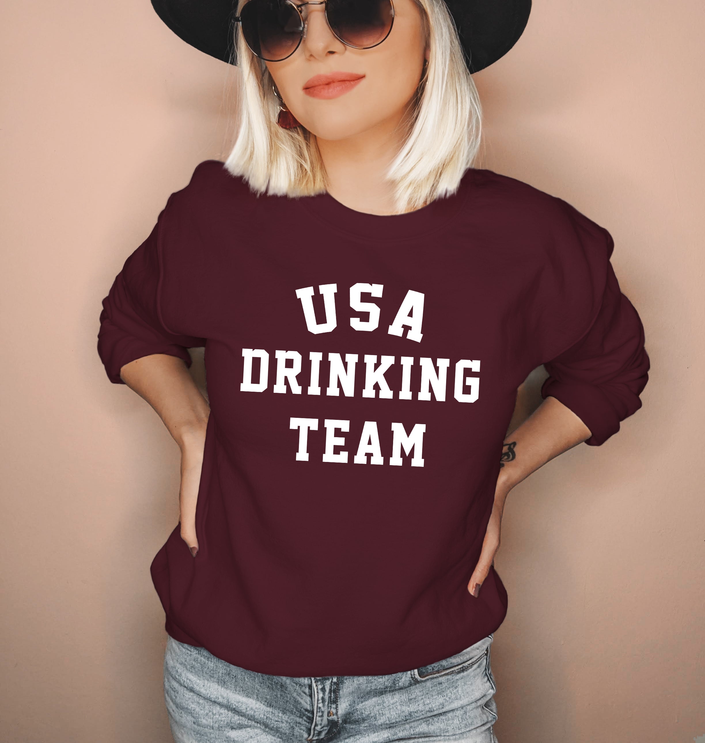 Maroon sweatshirt that says usa drinking team - HighCiti