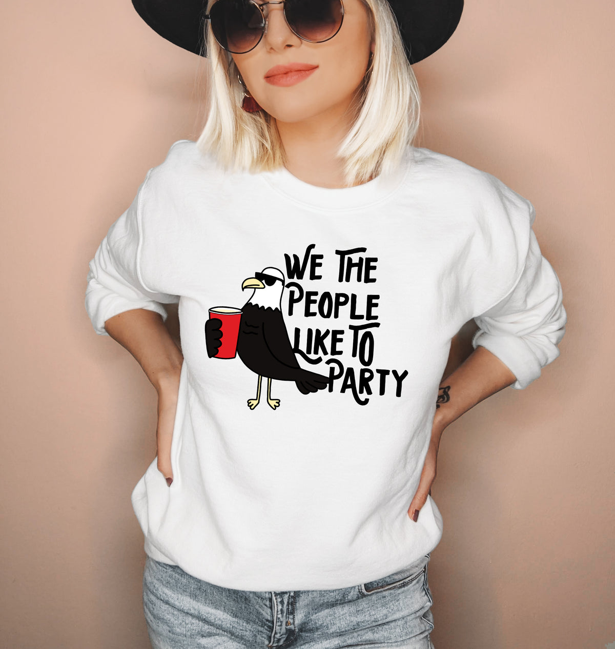 White sweatshirt with a bird drinking that says we te people like to party - HighCiti