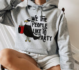 grey hoodie with a bird that says we the people like to party - HighCiti