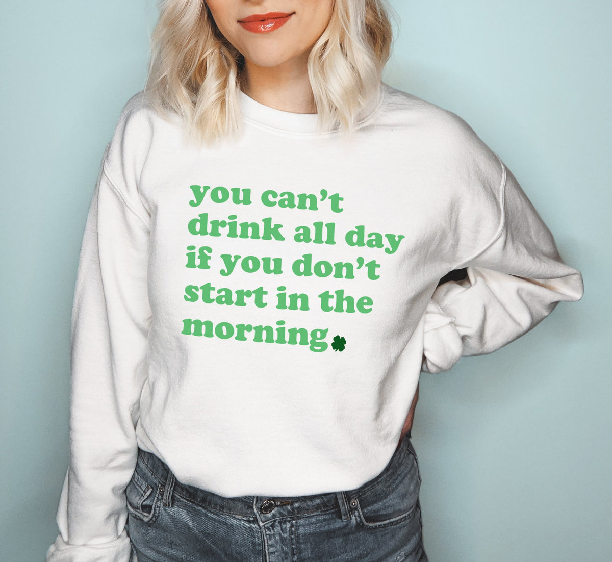 White sweatshirt with a shamrock leaf saying you can't drink all day if you don't start in the morning - HighCiti