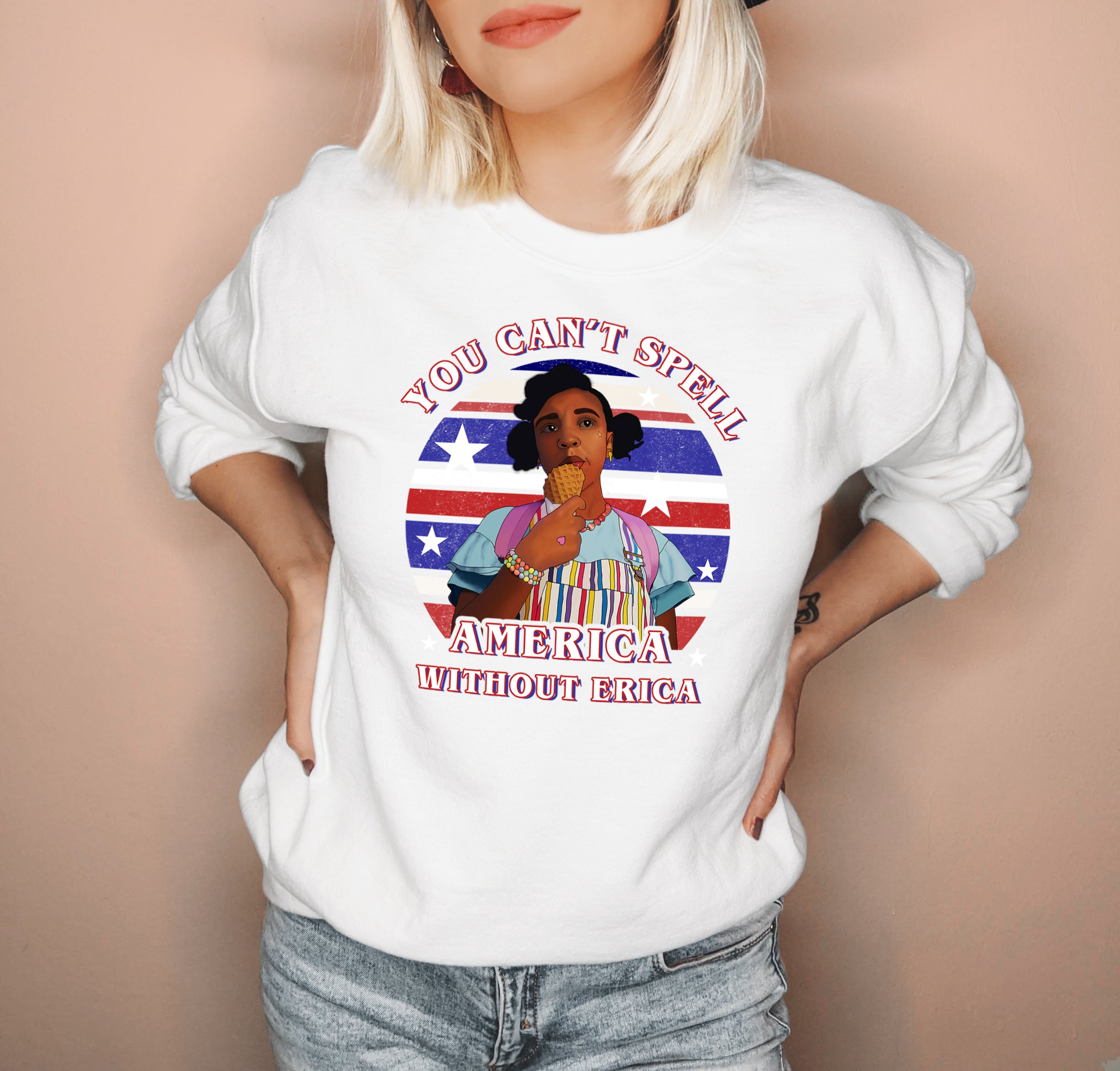White sweatshirt with erica from stranger things that says you can't spell america without erica - HighCiti